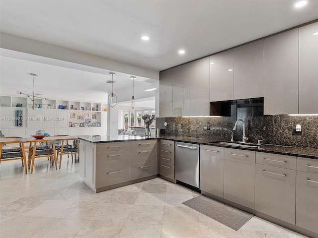 kitchen with dark stone counters, sink, stainless steel dishwasher, kitchen peninsula, and gray cabinets