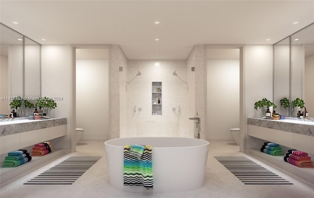 bathroom featuring vanity, tile flooring, and toilet