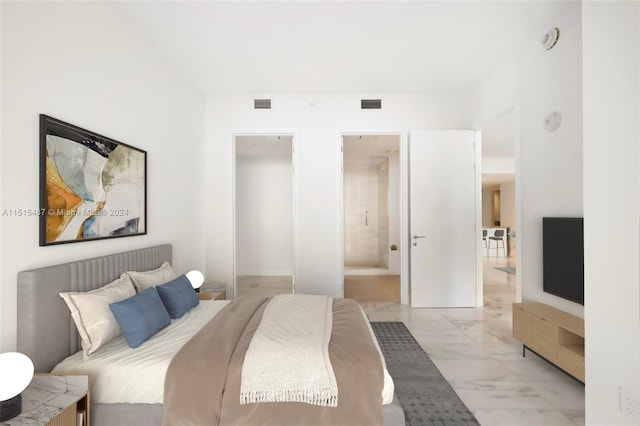 bedroom featuring light tile flooring