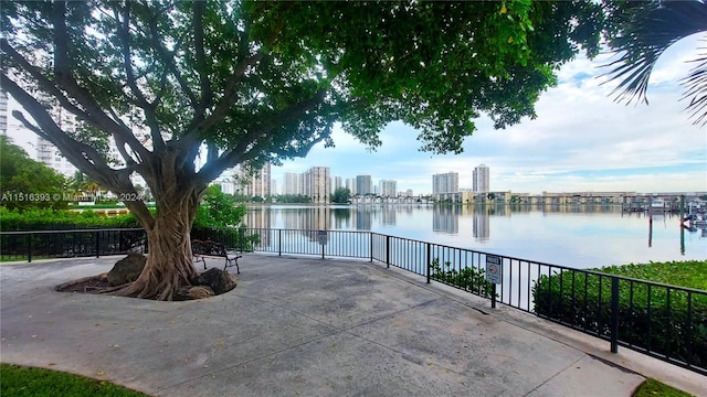 view of patio with a water view