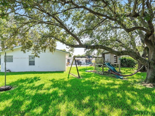 view of yard featuring a playground