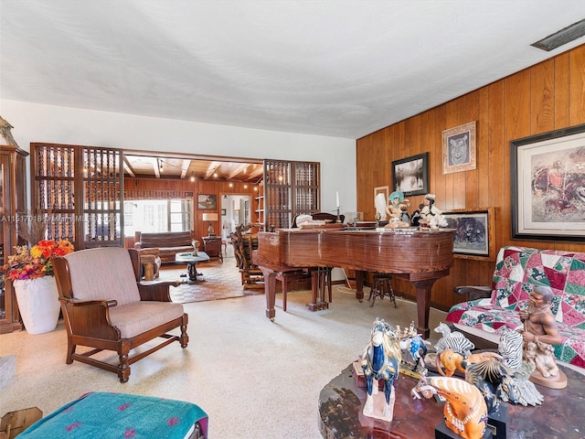 carpeted office with wood walls