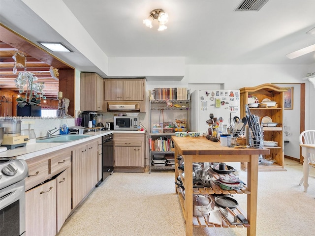 kitchen featuring parquet floors and ceiling fan