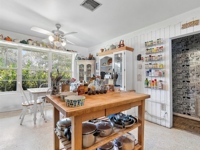 kitchen featuring parquet floors and ceiling fan