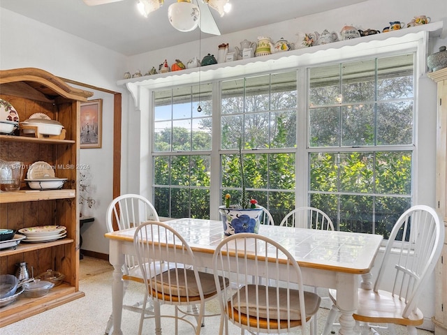 dining room with ceiling fan