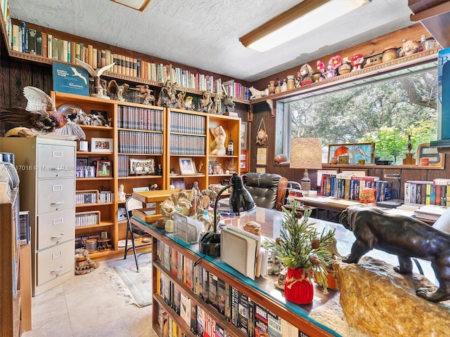 office featuring tile patterned flooring and a textured ceiling