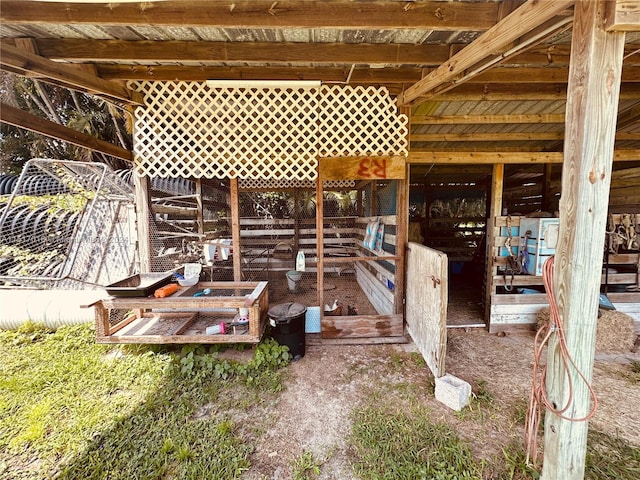 view of patio / terrace with an outbuilding