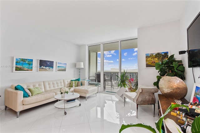 tiled living room with floor to ceiling windows