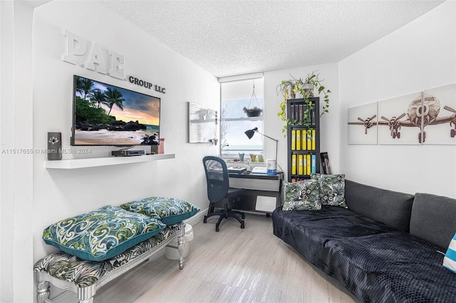 office area featuring a textured ceiling