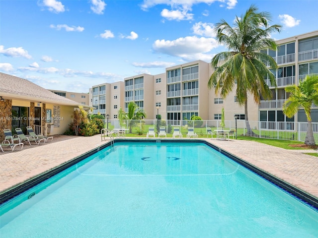 view of pool featuring a patio