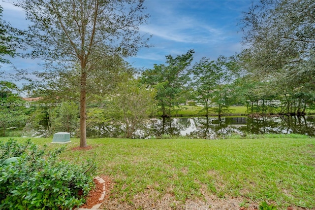 view of yard with a water view