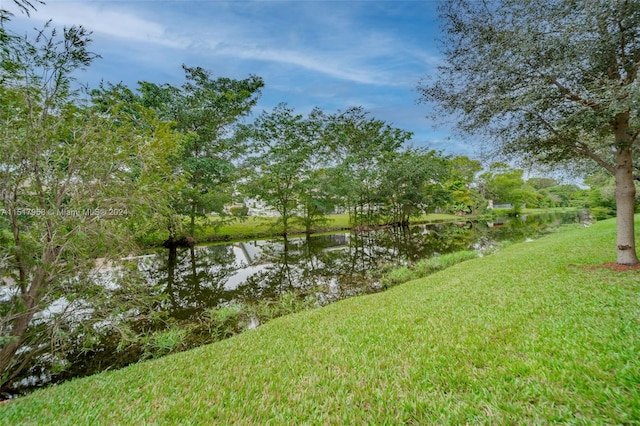 view of yard with a water view