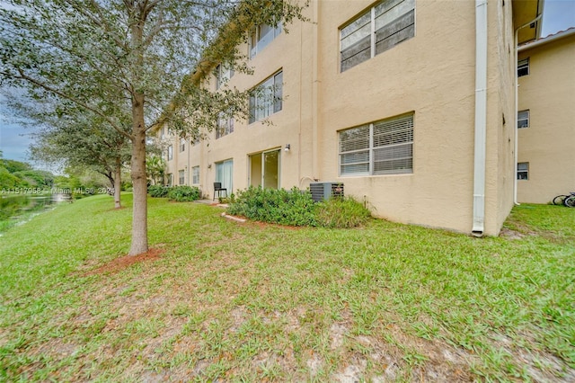 exterior space featuring central AC unit