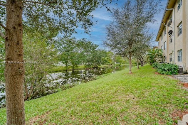 view of yard with a water view