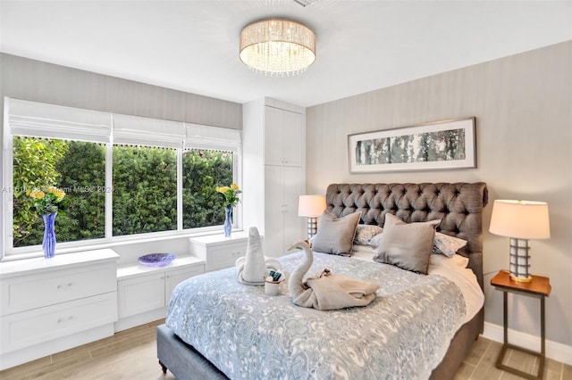 bedroom featuring light wood-type flooring