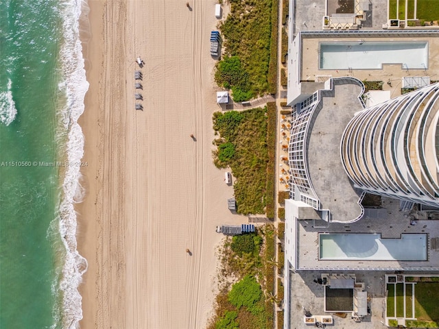 aerial view featuring a beach view and a water view