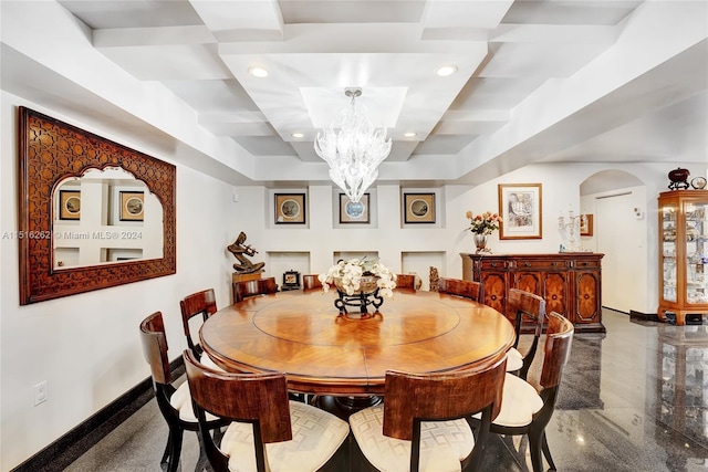 dining space with a chandelier