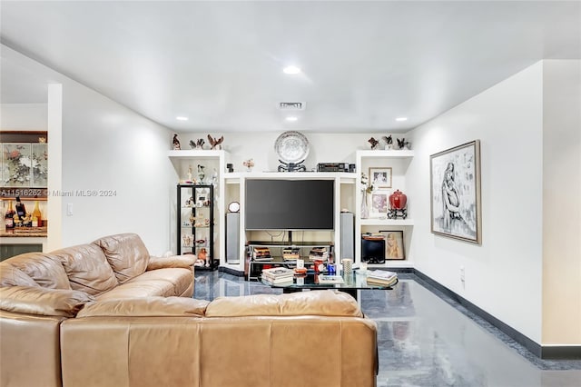 living room with concrete floors