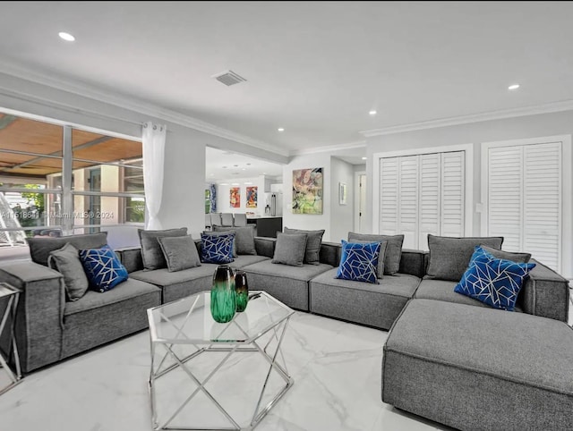 living room featuring crown molding