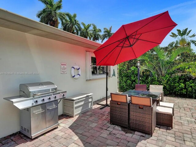 view of patio with a grill