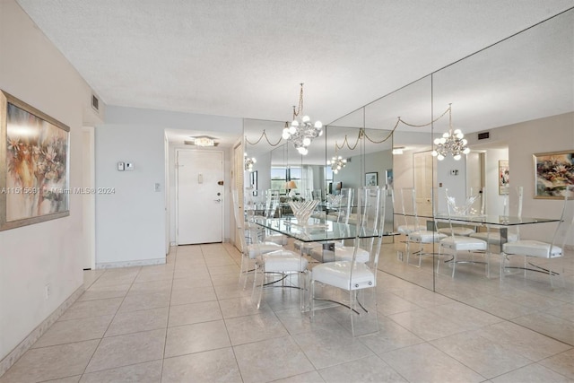 unfurnished dining area featuring a chandelier, light tile floors, and a textured ceiling