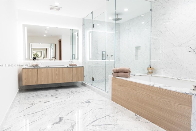 bathroom with vanity and plus walk in shower