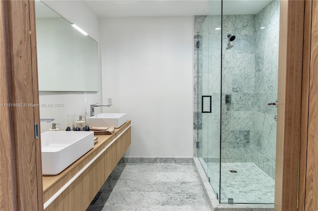 bathroom featuring vanity and a shower with door