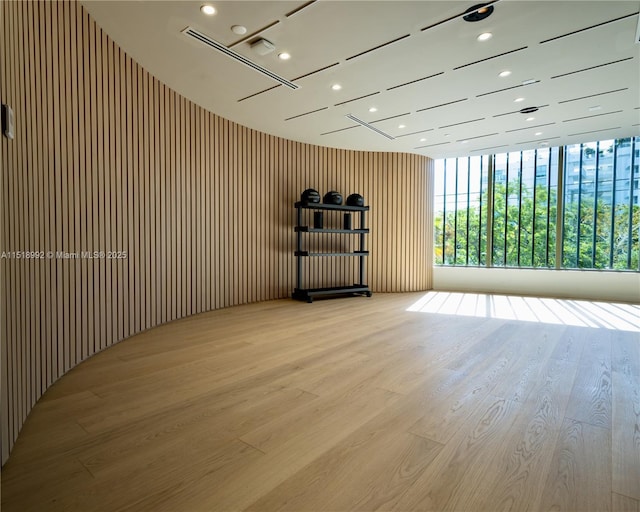 spare room featuring light wood-type flooring