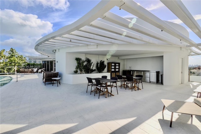 view of patio with exterior kitchen