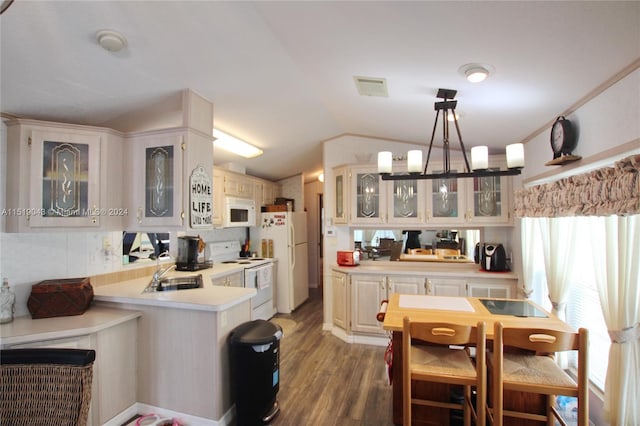 kitchen with glass insert cabinets, white appliances, light countertops, and white cabinets