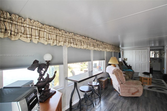 living room featuring dark wood-style floors