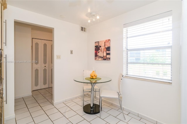 interior space featuring light tile patterned floors