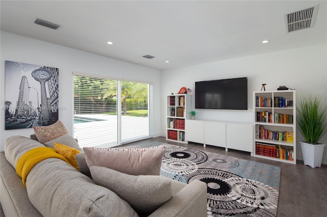 living room featuring dark hardwood / wood-style flooring