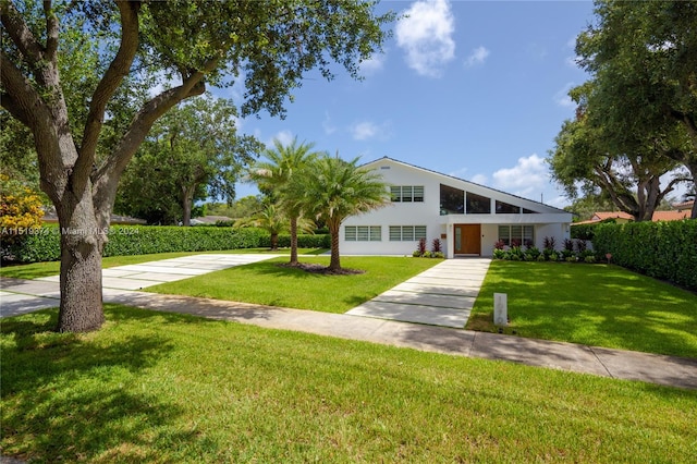 view of front of home with a front yard