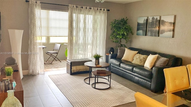 living room with tile patterned floors