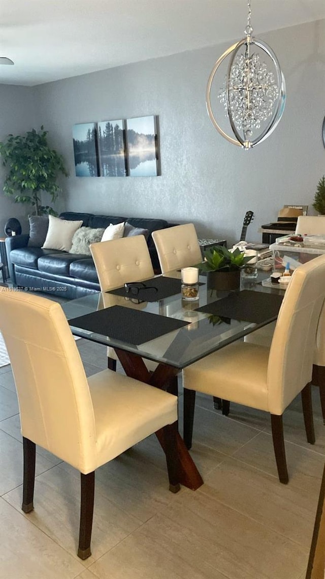 dining room featuring a notable chandelier