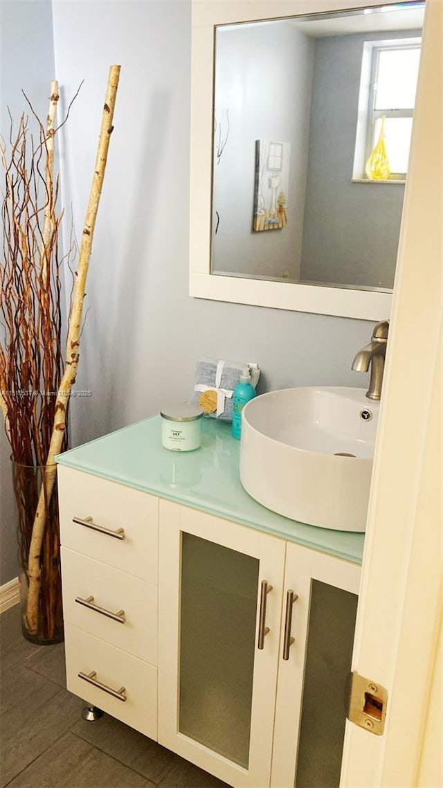 bathroom featuring vanity and tile patterned flooring