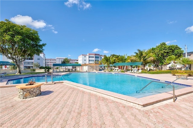 view of pool featuring a patio