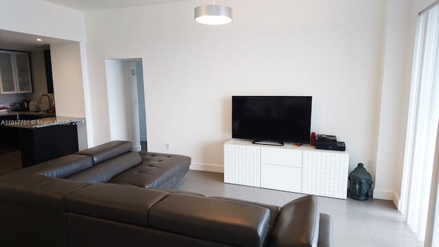 living room with light tile flooring