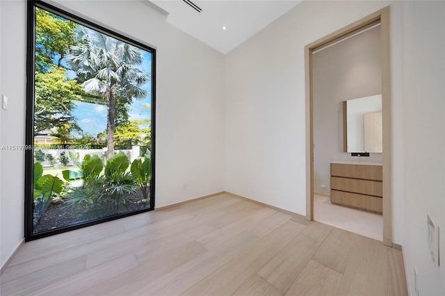 unfurnished room featuring light wood finished floors