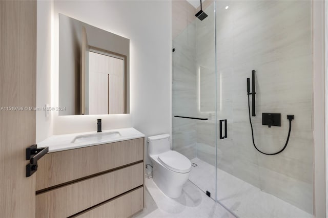 full bathroom with a shower stall, toilet, and vanity