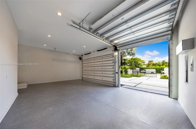 garage featuring baseboards