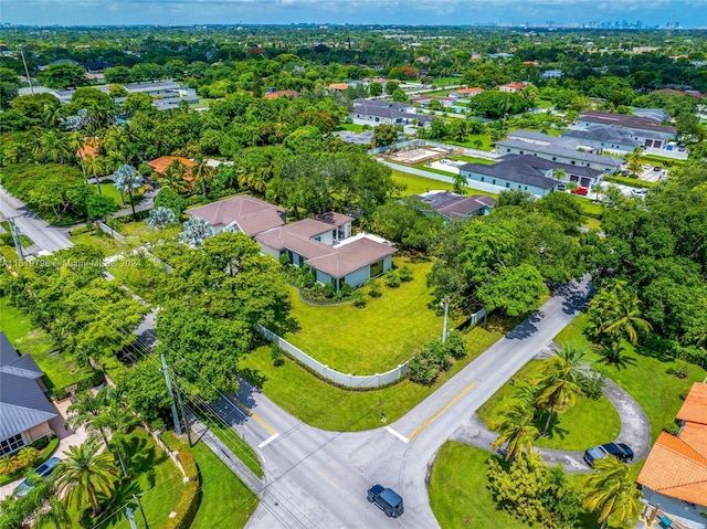 birds eye view of property with a residential view