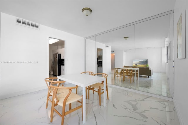 view of tiled dining room