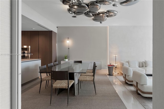 dining room with a notable chandelier