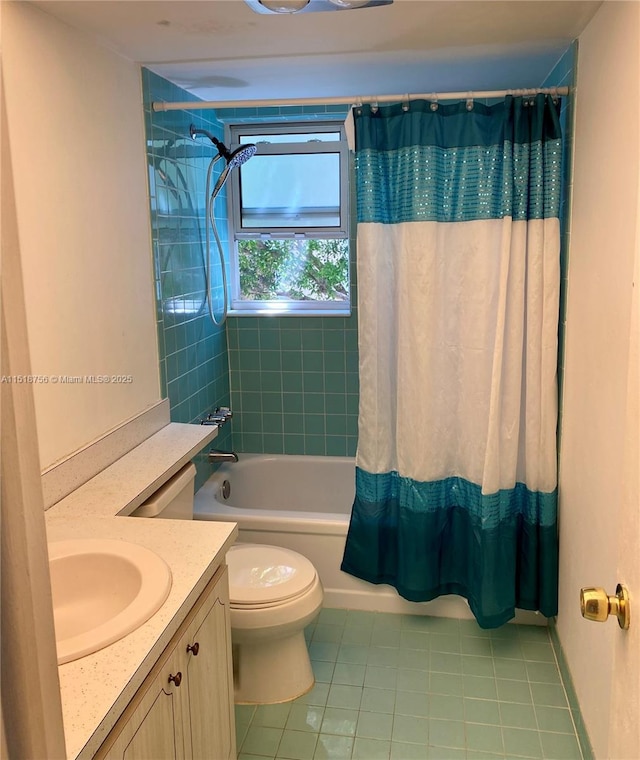 full bathroom featuring vanity, tile patterned flooring, shower / bath combination with curtain, and toilet