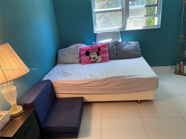 bedroom with tile patterned floors