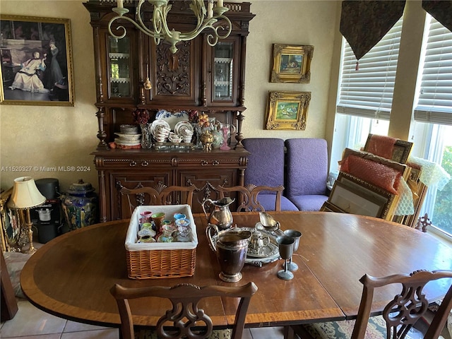 dining area featuring a chandelier