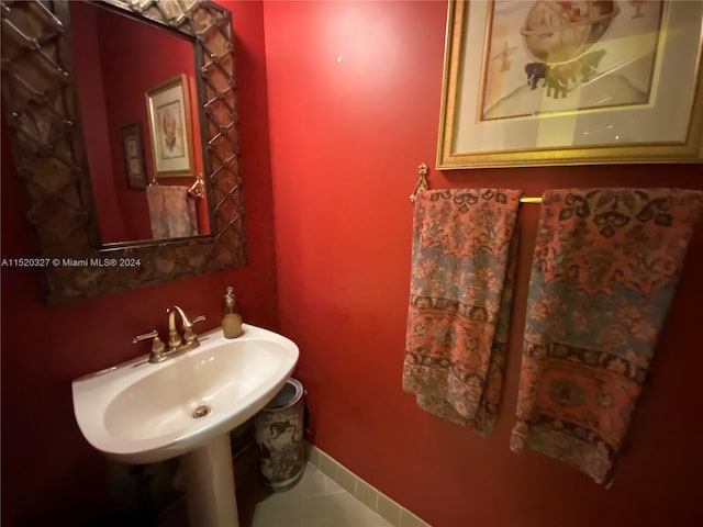 bathroom featuring tile flooring