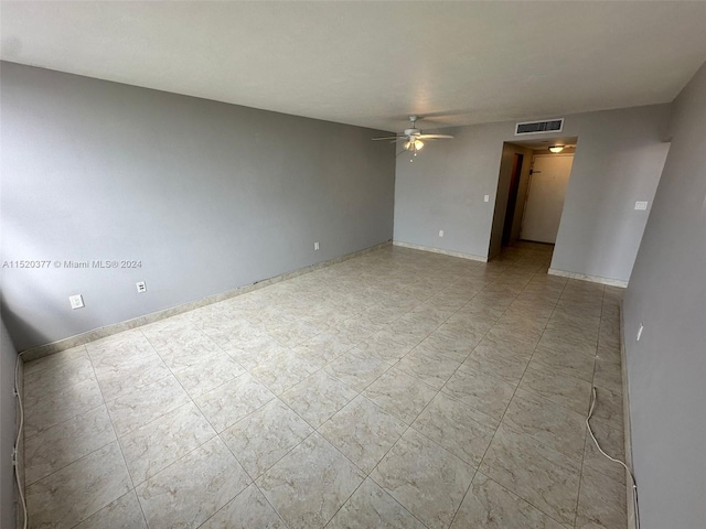 empty room featuring ceiling fan